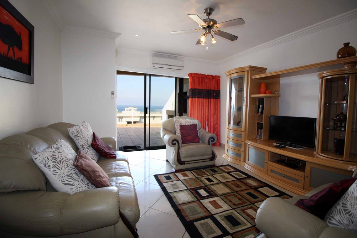 Uvongo South Coast KZN ground floor 6 sleeper luxury apartment - Aqua Surf 1-lounge TV