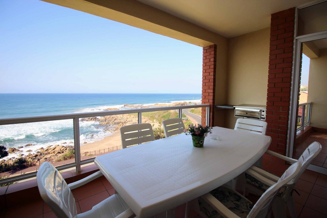 On the Margate seafront South Coast of KZN is Balooga 8. A 7 sleeper lovely seaviews - Patio - Happy Holiday Homes