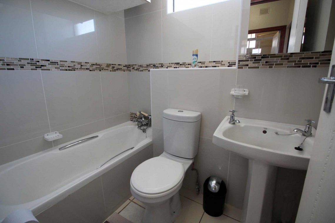 C - Front 11 is a self-catering holiday penthouse on Manaba sea front with an 180 degree sea view that sleeps 7 and is walking distance to Lucien Blue Flag Beach.