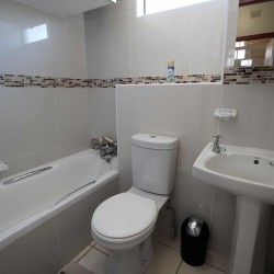 C - Front 11 is a self-catering holiday penthouse on Manaba sea front with an 180 degree sea view that sleeps 7 and is walking distance to Lucien Blue Flag Beach.