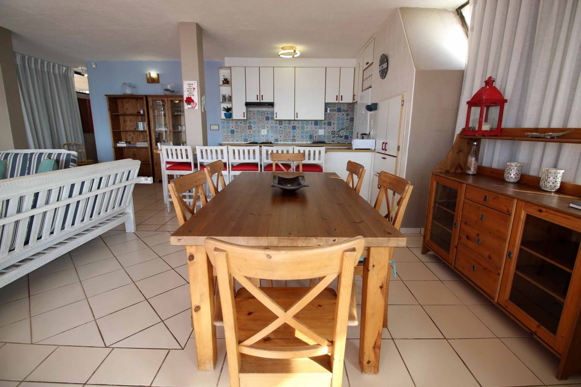 C - Front 11 is a self-catering holiday penthouse on Manaba sea front with an 180 degree sea view that sleeps 7 and is walking distance to Lucien Blue Flag Beach.