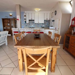 C - Front 11 is a self-catering holiday penthouse on Manaba sea front with an 180 degree sea view that sleeps 7 and is walking distance to Lucien Blue Flag Beach.