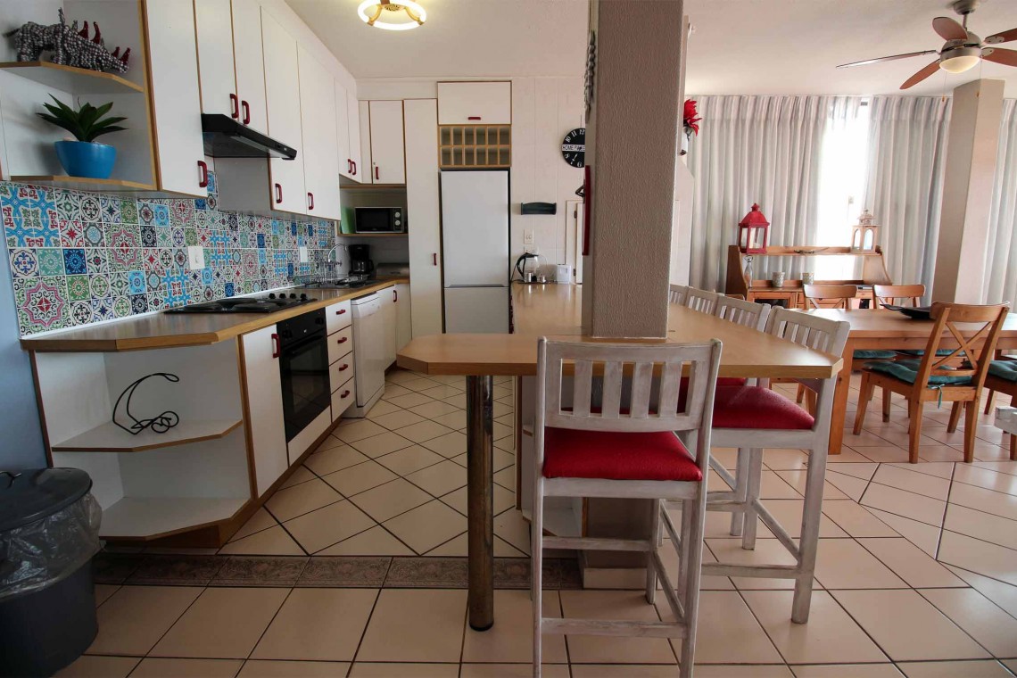 C - Front 11 is a self-catering holiday penthouse on Manaba sea front with an 180 degree sea view that sleeps 7 and is walking distance to Lucien Blue Flag Beach.