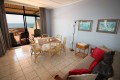 C - Front 11 is a penthouse on Manaba sea front with an 180 degree sea view that sleeps 7 and is walking distance to Lucien Blue Flag Beach.