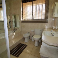 C - Front 11 is a self-catering holiday penthouse on Manaba sea front with an 180 degree sea view that sleeps 7 and is walking distance to Lucien Blue Flag Beach.