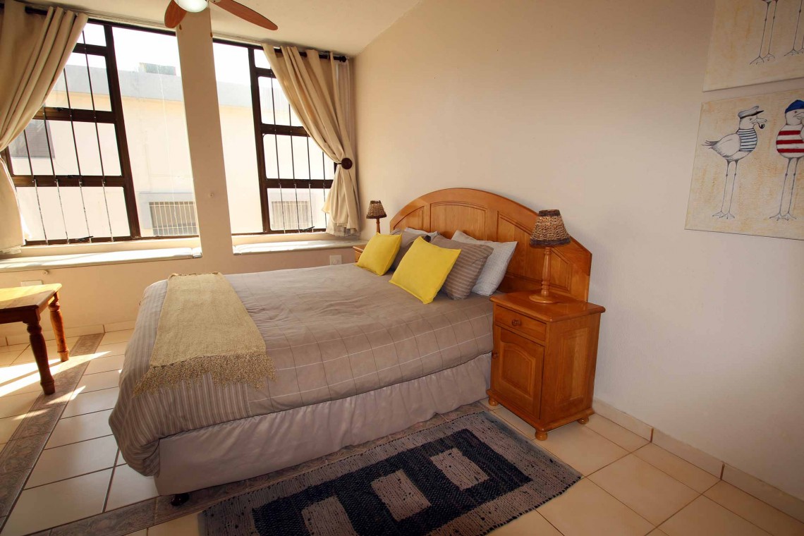 C - Front 11 is a self-catering holiday penthouse on Manaba sea front with an 180 degree sea view that sleeps 7 and is walking distance to Lucien Blue Flag Beach.