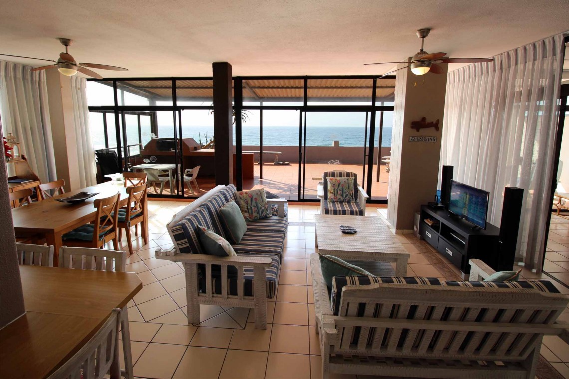 C - Front 11 is a penthouse on Manaba sea front with an 180 degree sea view that sleeps 7 and is walking distance to Lucien Blue Flag Beach.