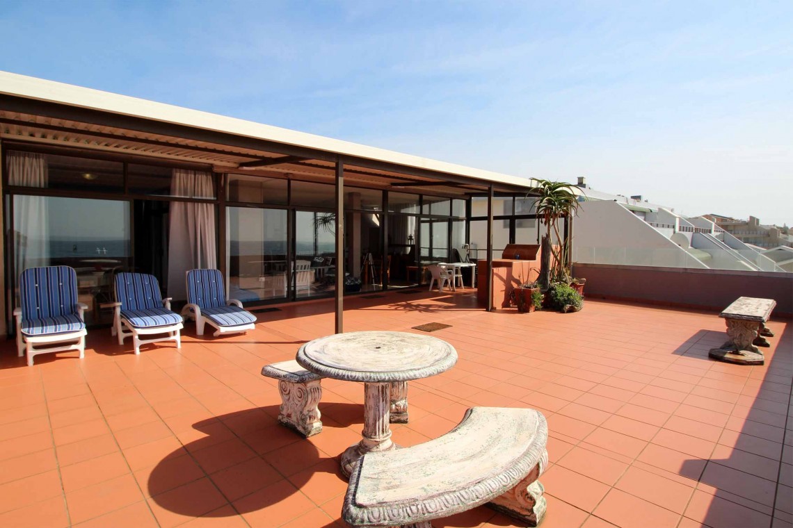 C - Front 11 is a self-catering holiday penthouse on Manaba sea front with an 180 degree sea view that sleeps 7 and is walking distance to Lucien Blue Flag Beach.