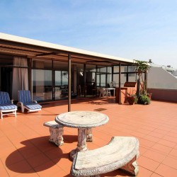 C - Front 11 is a self-catering holiday penthouse on Manaba sea front with an 180 degree sea view that sleeps 7 and is walking distance to Lucien Blue Flag Beach.