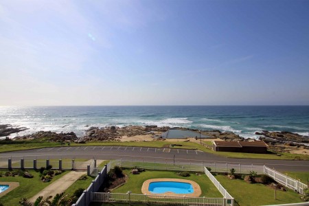 C - Front 11 is a penthouse on Manaba sea front with an 180 degree sea view that sleeps 7 and is walking distance to Lucien Blue Flag Beach.