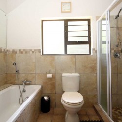 Castaro Beach Lodge - 4 Bedroom 8 sleeper self-catering holiday house in Ramsgate with solar panels and filtered borehole water - South Coast of KZN.