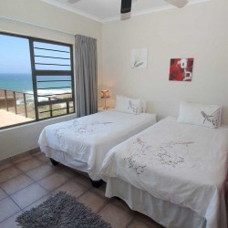 Castaro Beach Lodge - 4 Bedroom 8 sleeper self-catering holiday house in Ramsgate with solar panels and filtered borehole water - South Coast of KZN.