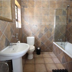 Castaro Beach Lodge - 4 Bedroom 8 sleeper self-catering holiday house in Ramsgate with solar panels and filtered borehole water - South Coast of KZN.
