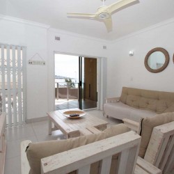 On the seafront at the Margate Pier, Dolphin View 103 is a short stroll into the coastal town of Margate town on the South Coast of KwaZulu Natal.