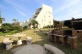 Chesapeake Bay 38 in on the beach in Margate on the South Coast of KZN. The 5 sleeper self-catering holiday flat has tennis courts, pool, coin operated laundry and jungle gym - Happy Holiday Homes - Building