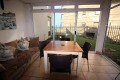 Chesapeake Bay 38 in on the beach in Margate on the South Coast of KZN. The 5 sleeper self-catering holiday flat has tennis courts, pool, coin operated laundry and jungle gym - Happy Holiday Homes - Patio