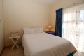 On the Margate seafront South Coast of KZN is Balooga 8. A 7 sleeper lovely seaviews - 2nd Bedroom - Happy Holiday Homes