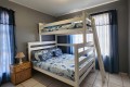 The 2nd bedroom of Chesapeake Bay 38. The 5 sleeper self-catering holiday flat has tennis courts, pool, coin operated laundry and jungle gym and is on the beach in Margate on the South Coast of KZN - Happy Holiday Homes