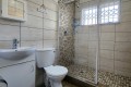 The bathroom of Chesapeake Bay 38. The 5 sleeper self-catering holiday flat has tennis courts, pool, coin operated laundry and jungle gym and is on the beach in Margate on the South Coast of KZN - Happy Holiday Homes