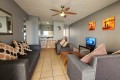 The lounge of Chesapeake Bay 38. The 5 sleeper self-catering holiday flat has tennis courts, pool, coin operated laundry and jungle gym and is on the beach in Margate on the South Coast of KZN - Happy Holiday Homes