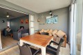 The patio of Chesapeake Bay 38. The 5 sleeper self-catering holiday flat has tennis courts, pool, coin operated laundry and jungle gym and is on the beach in Margate on the South Coast of KZN - Happy Holiday Homes
