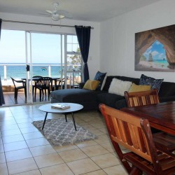 On Margate seafront Chesapeake Bay 22 has tennis courts and a swimming pool - Sleeps 4 guests - South Coast KwaZulu-Natal self-catering Accommodation - Happy Holiday Homes