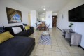 On Margate seafront Chesapeake Bay 22 has tennis courts and a swimming pool - Sleeps 4 guests - South Coast KwaZulu-Natal self-catering Accommodation - Happy Holiday Homes