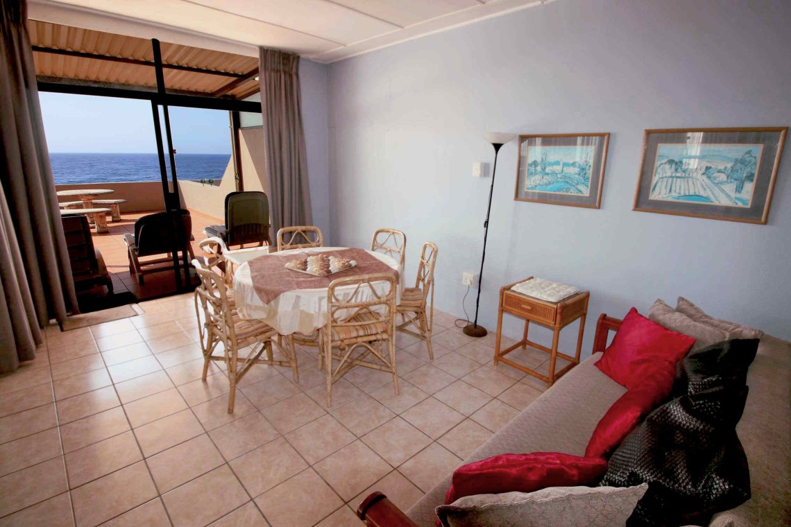 C - Front 11 is a self-catering holiday penthouse on Manaba sea front with an 180 degree sea view that sleeps 7 and is walking distance to Lucien Blue Flag Beach.