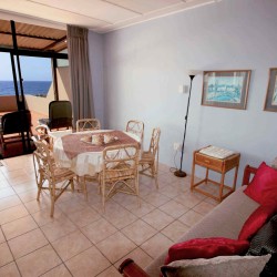 C - Front 11 is a self-catering holiday penthouse on Manaba sea front with an 180 degree sea view that sleeps 7 and is walking distance to Lucien Blue Flag Beach.