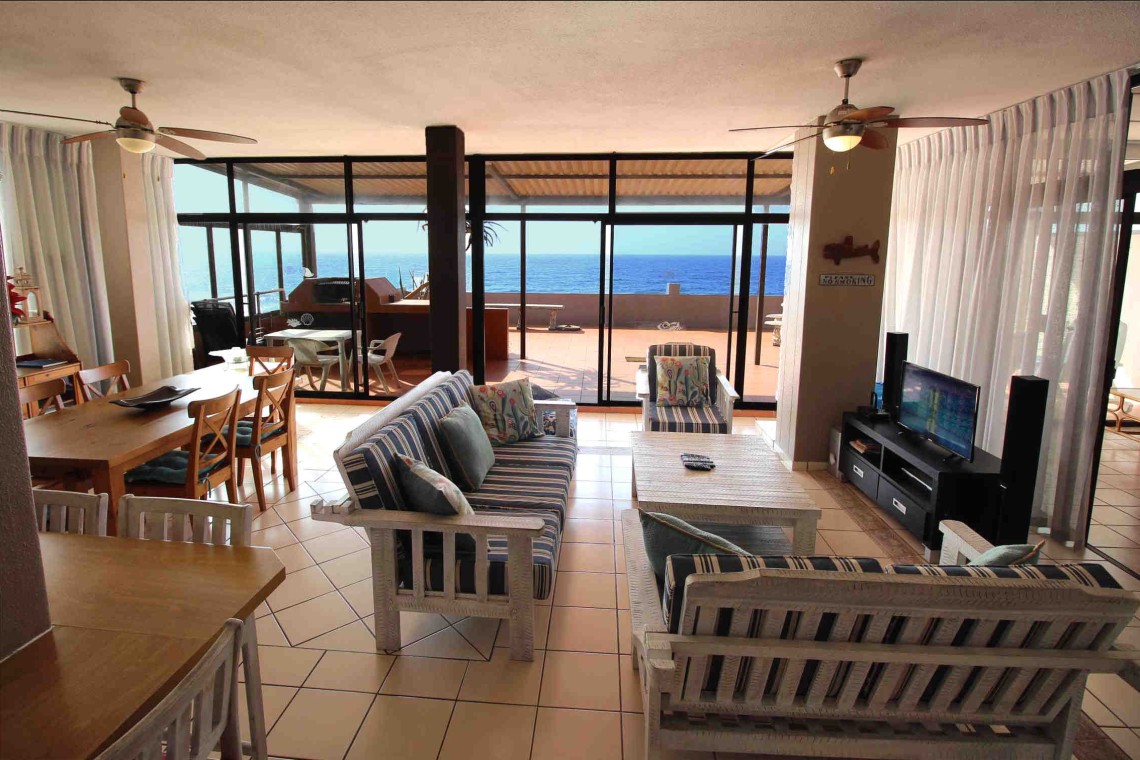 C - Front 11 is a self-catering holiday penthouse on Manaba sea front with an 180 degree sea view that sleeps 7 and is walking distance to Lucien Blue Flag Beach.