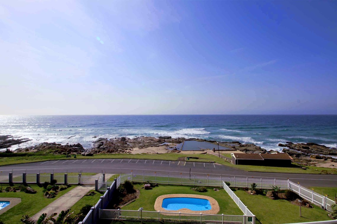C - Front 11 is a self-catering holiday penthouse on Manaba sea front with an 180 degree sea view that sleeps 7 and is walking distance to Lucien Blue Flag Beach.