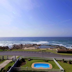 C - Front 11 is a self-catering holiday penthouse on Manaba sea front with an 180 degree sea view that sleeps 7 and is walking distance to Lucien Blue Flag Beach.