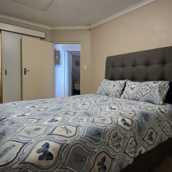 Uvongo Chalets 27 is a self-catering 6 sleeper flat on Lilliecrona Boulevard in Uvongo on the South Coast of KwaZulu Natal in South Africa. The property offers solar power with an inverter, internet, WiFi, Netflix, DSTV and filtered drinking water.