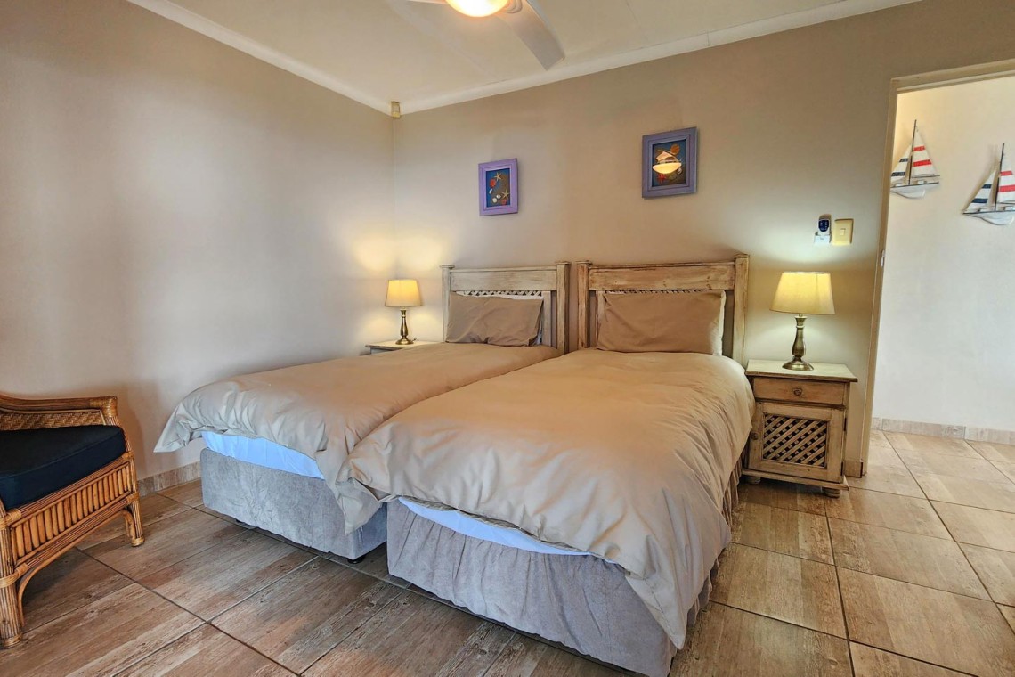 Uvongo Chalets 27 is a self-catering 6 sleeper flat on Lilliecrona Boulevard in Uvongo on the South Coast of KwaZulu Natal in South Africa. The property offers solar power with an inverter, internet, WiFi, Netflix, DSTV and filtered drinking water.