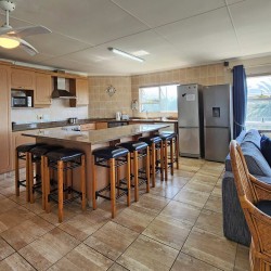 Uvongo Chalets 27 is a self-catering 6 sleeper flat on Lilliecrona Boulevard in Uvongo on the South Coast of KwaZulu Natal in South Africa. The property offers solar power with an inverter, internet, WiFi, Netflix, DSTV and filtered drinking water.