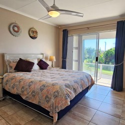 Uvongo Chalets 27 is a self-catering 6 sleeper flat on Lilliecrona Boulevard in Uvongo on the South Coast of KwaZulu Natal in South Africa. The property offers solar power with an inverter, internet, WiFi, Netflix, DSTV and filtered drinking water.