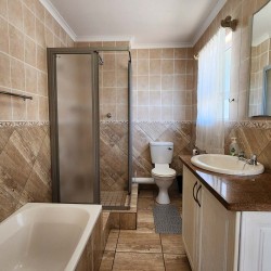 Uvongo Chalets 27 is a self-catering 6 sleeper flat on Lilliecrona Boulevard in Uvongo on the South Coast of KwaZulu Natal in South Africa. The property offers solar power with an inverter, internet, WiFi, Netflix, DSTV and filtered drinking water.