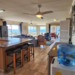 Uvongo Chalets 27 is a self-catering 6 sleeper flat on Lilliecrona Boulevard in Uvongo on the South Coast of KwaZulu Natal in South Africa. The property offers solar power with an inverter, internet, WiFi, Netflix, DSTV and filtered drinking water.