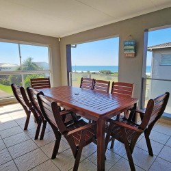 Uvongo Chalets 27 is a self-catering 6 sleeper flat on Lilliecrona Boulevard in Uvongo on the South Coast of KwaZulu Natal in South Africa. The property offers solar power with an inverter, internet, WiFi, Netflix, DSTV and filtered drinking water.