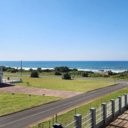 Uvongo Chalets 27 is a self-catering 6 sleeper flat on Lilliecrona Boulevard in Uvongo on the South Coast of KwaZulu Natal in South Africa. The property offers solar power with an inverter, internet, WiFi, Netflix, DSTV and filtered drinking water.