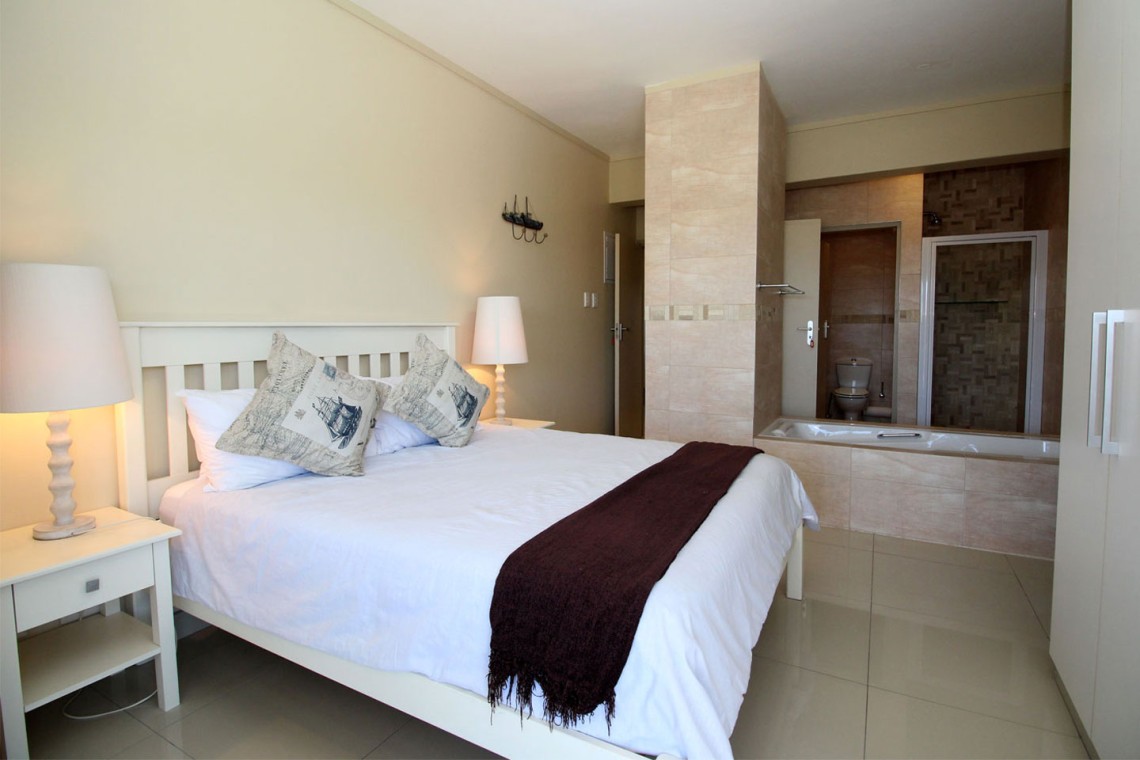 Whale Rock 16 is a 3 bedroom, 6 sleeper self-catering holiday flat in Margate on the South Coast of KZN - The main bedroom.