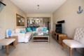 Whale Rock 16 is a 3 bedroom, 6 sleeper self-catering holiday flat in Margate on the South Coast of KZN - The open plan living.