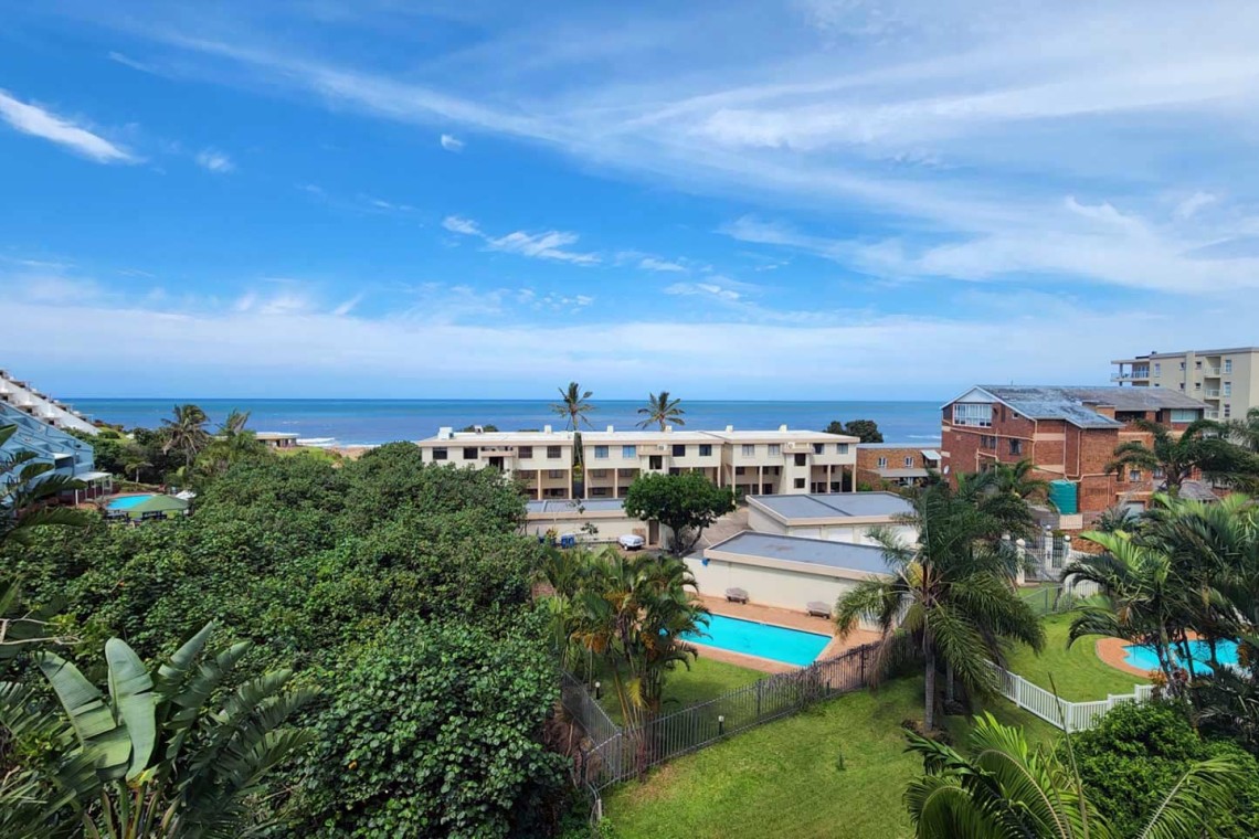 Walk to Lucien Main Beach from Mont Blanc 26 a ground floor, 3 bedroom, 6 sleeper self-catering holiday flat in Manaba Beach on the South Coast of KwaZulu Natal in South Africa with air conditioner, NETFLIX and WIFI and DSTV.
