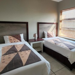 Indigo Bay 25 is a luxury, self-catering, 4 bedroom, 8 sleeper on the Manaba beachfront with stunning sea views from Lucien Beach to Margate Beach on the South Coast of KwaZulu Natal.