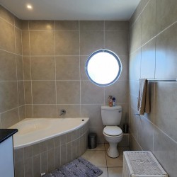 Indigo Bay 25 is a luxury, self-catering, 4 bedroom, 8 sleeper on the Manaba beachfront with stunning sea views from Lucien Beach to Margate Beach on the South Coast of KwaZulu Natal.