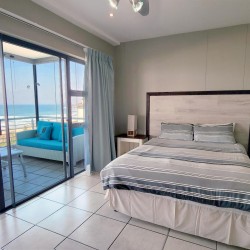 Indigo Bay 25 is a luxury, self-catering, 4 bedroom, 8 sleeper on the Manaba beachfront with stunning sea views from Lucien Beach to Margate Beach on the South Coast of KwaZulu Natal.