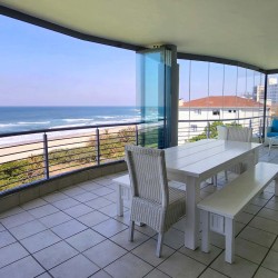 Indigo Bay 25 is a luxury, self-catering, 4 bedroom, 8 sleeper on the Manaba beachfront with stunning sea views from Lucien Beach to Margate Beach on the South Coast of KwaZulu Natal.