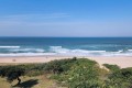 Indigo Bay 25 is a luxury, self-catering, 4 bedroom, 8 sleeper on the Manaba beachfront with stunning sea views from Lucien Beach to Margate Beach on the South Coast of KwaZulu Natal.