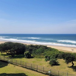 Indigo Bay 25 is a luxury, self-catering, 4 bedroom, 8 sleeper on the Manaba beachfront with stunning sea views from Lucien Beach to Margate Beach on the South Coast of KwaZulu Natal.
