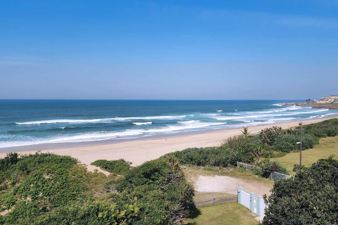 Indigo Bay 25 is a luxury, self-catering, 4 bedroom, 8 sleeper on the Manaba beachfront with stunning sea views from Lucien Beach to Margate Beach on the South Coast of KwaZulu Natal.